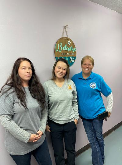 Louiza Chan with two people from Vernon Parish Animal Shelter